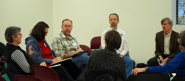 Photo of a community meeting with environmental groups.