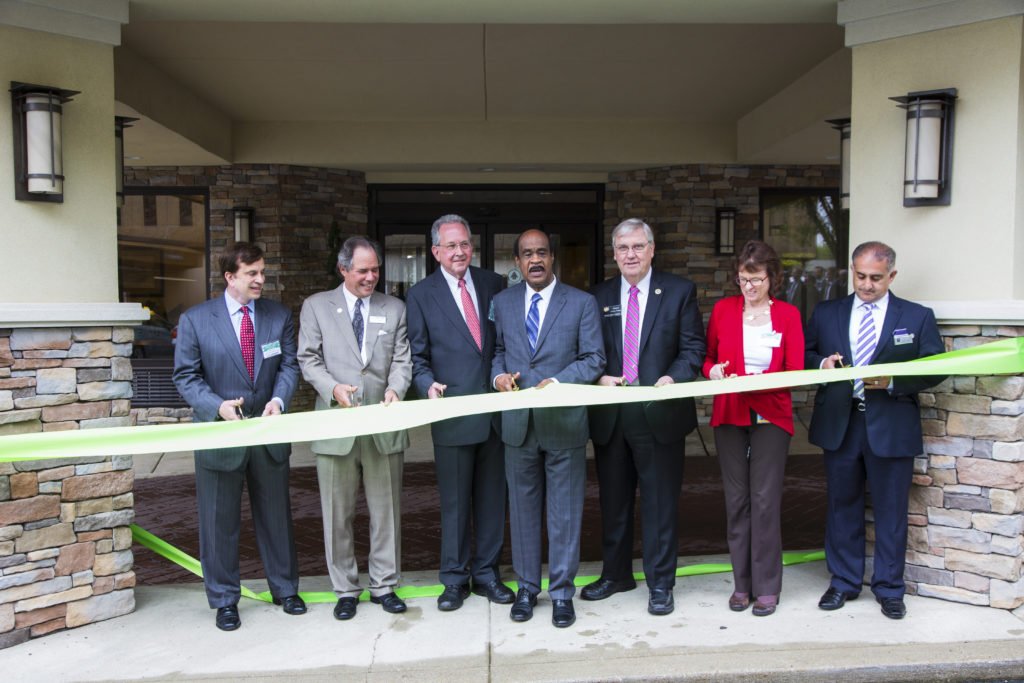 County Executive Ike Leggett presiding over the first completed commercial clean energy project in Maryland's “green” ribbon-cutting.